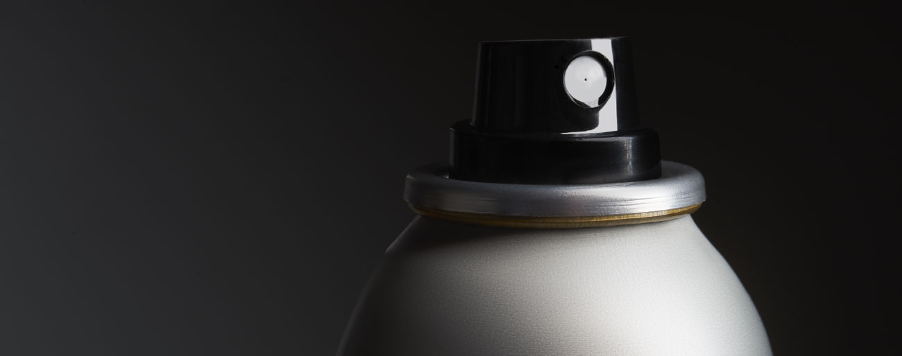 closeup-shot-metal-bottle-with-spray-b closeup-shot-metal-bottle-with-spray-b
